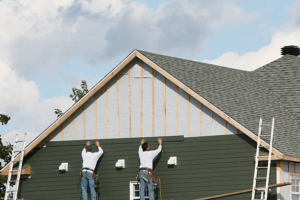 Professional Siding Installation technician working in Calvin, PA